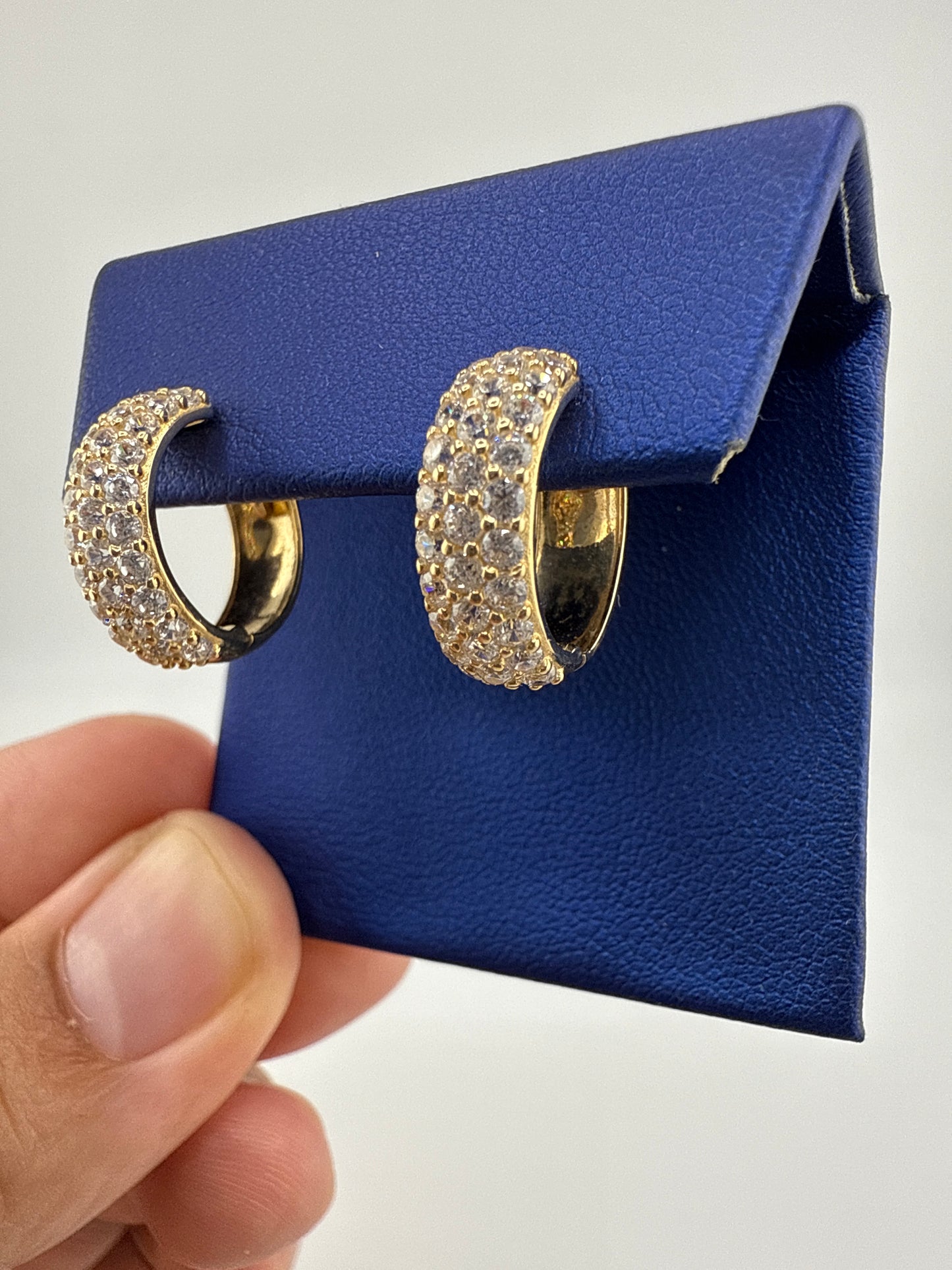 14k yellow gold and zirconia huggie earrings
