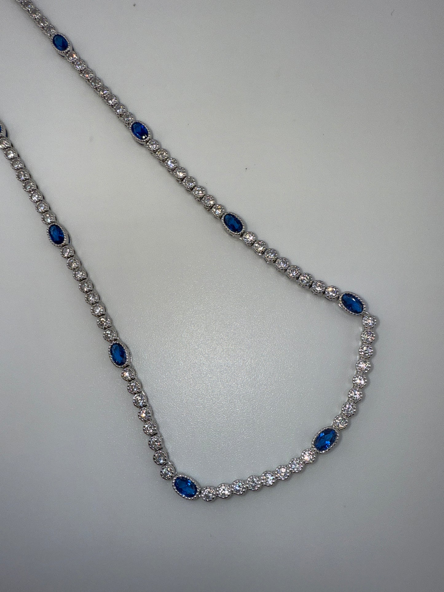 Sterling Silver Beaded Outline Oval & Round Zirconia Tennis Necklace - Sapphire