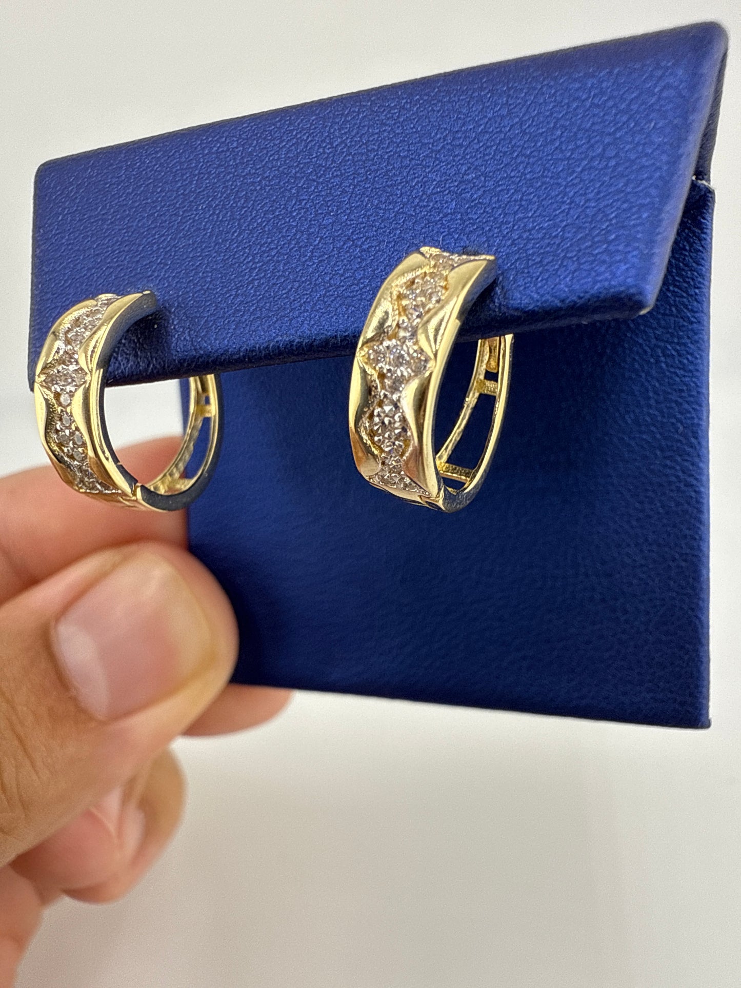 14k yellow gold and zirconia huggie earrings