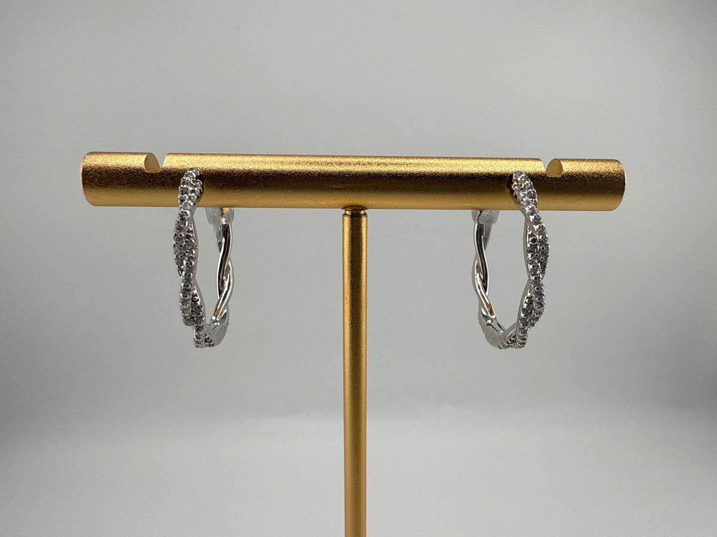 Sterling Silver Twisted Zirconia Hoop Earrings