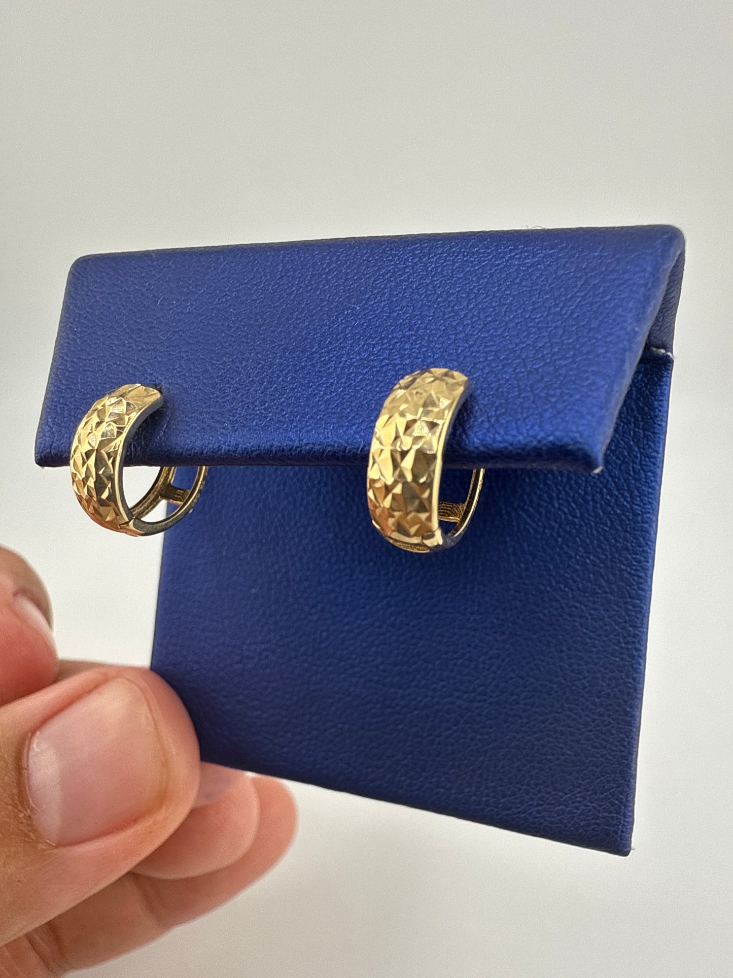 14k gold huggie earrings | hammered design | open backing