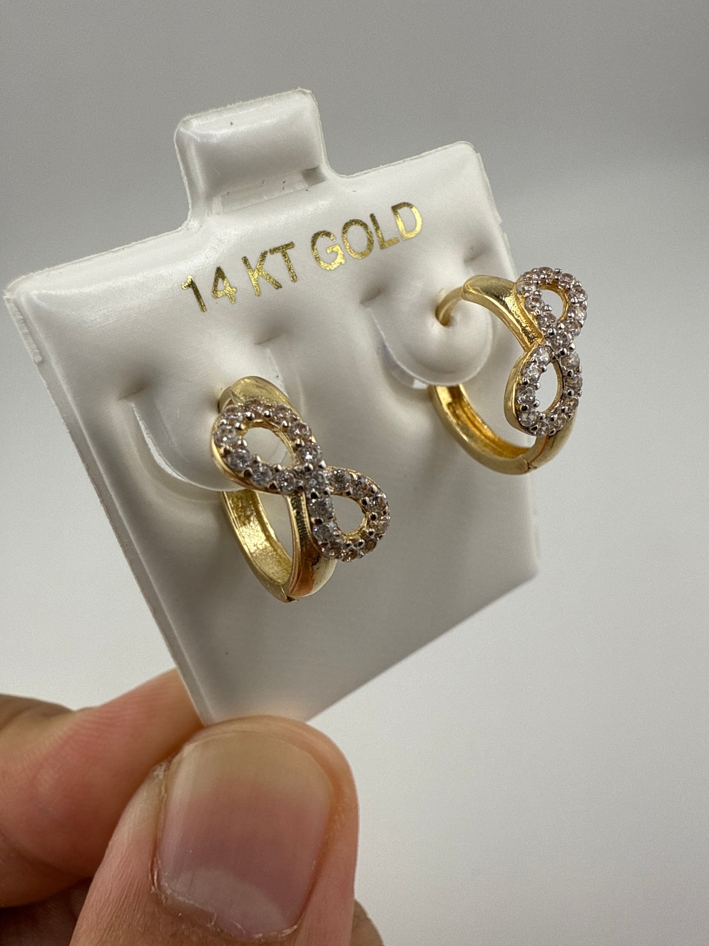 14k Yellow Gold and Zirconia Bow Huggie Earrings