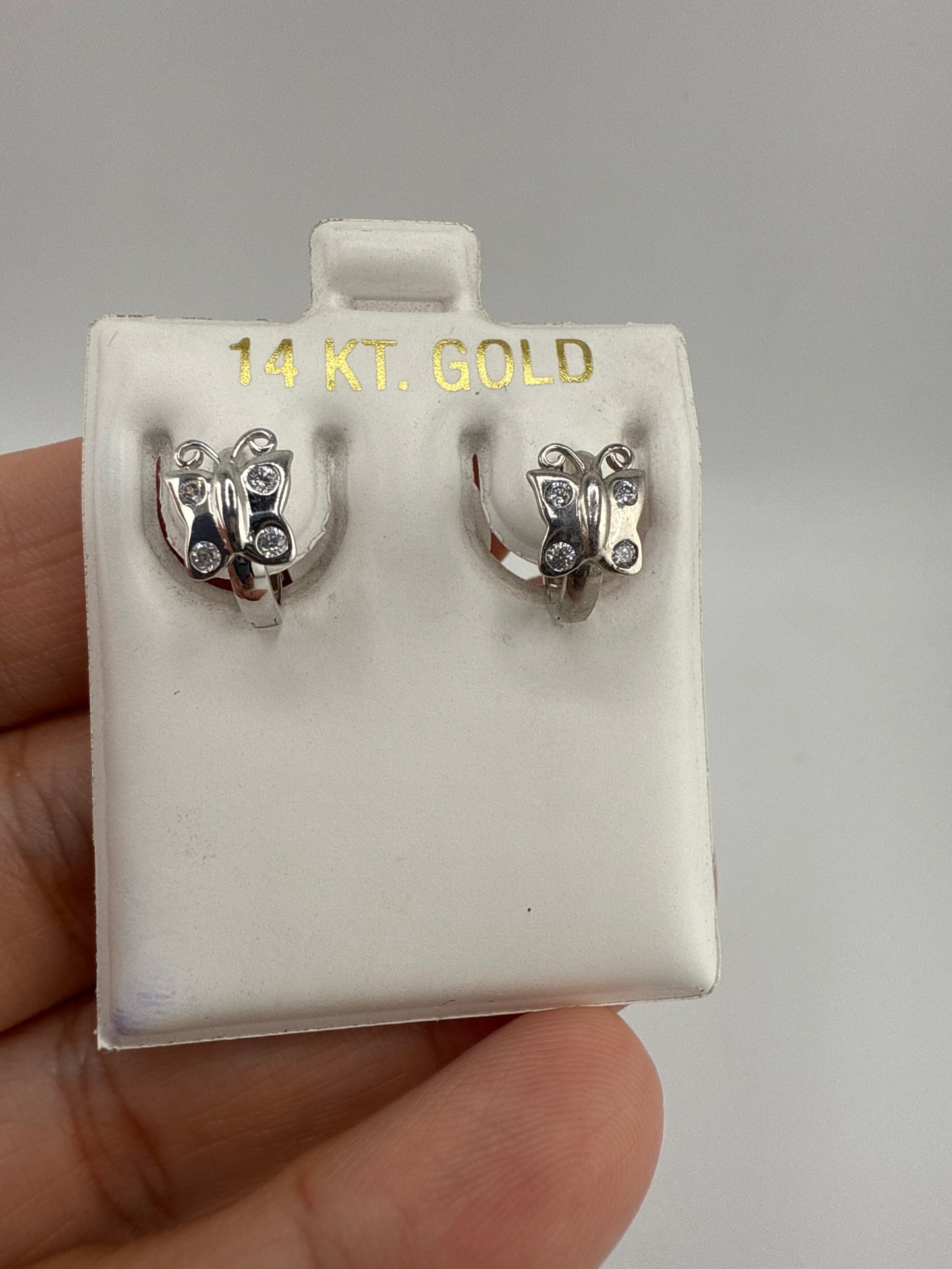 14k White Gold and Zirconia small Children’s Huggie Earrings with Butterfly detail
