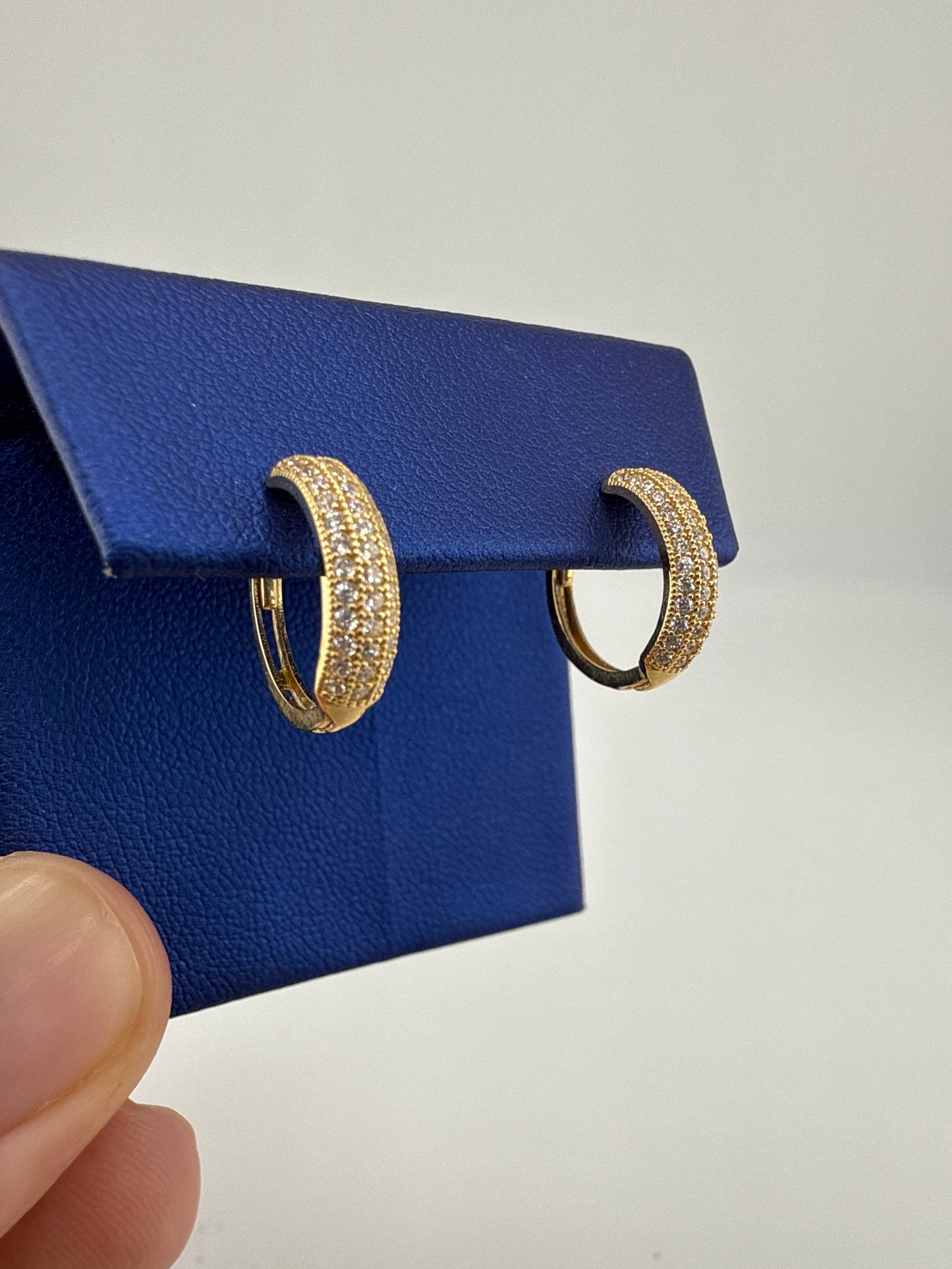14k yellow gold and zirconia huggie earrings, sophisticated and timeless design