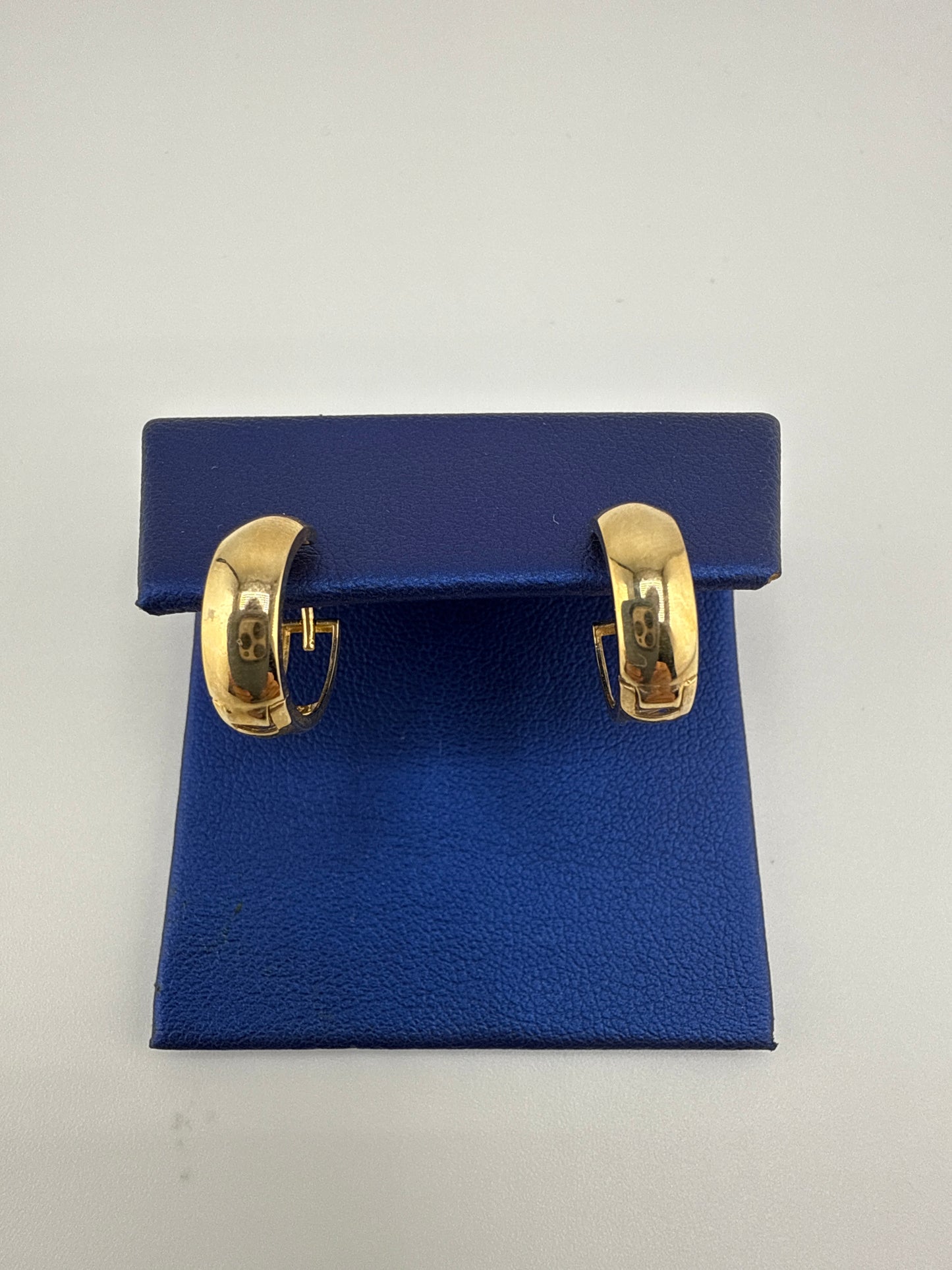 14k gold huggie earrings simple design and open backing