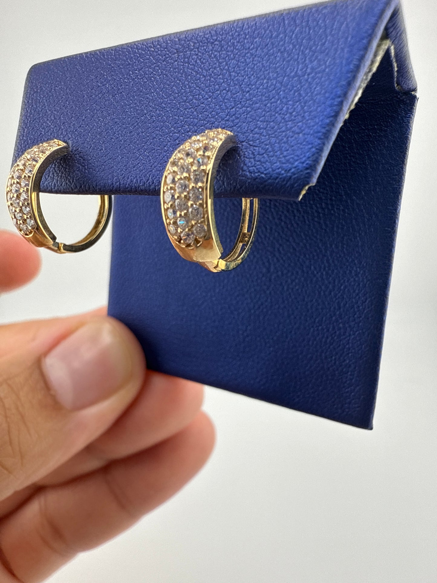 14k yellow gold and zirconia huggie earrings