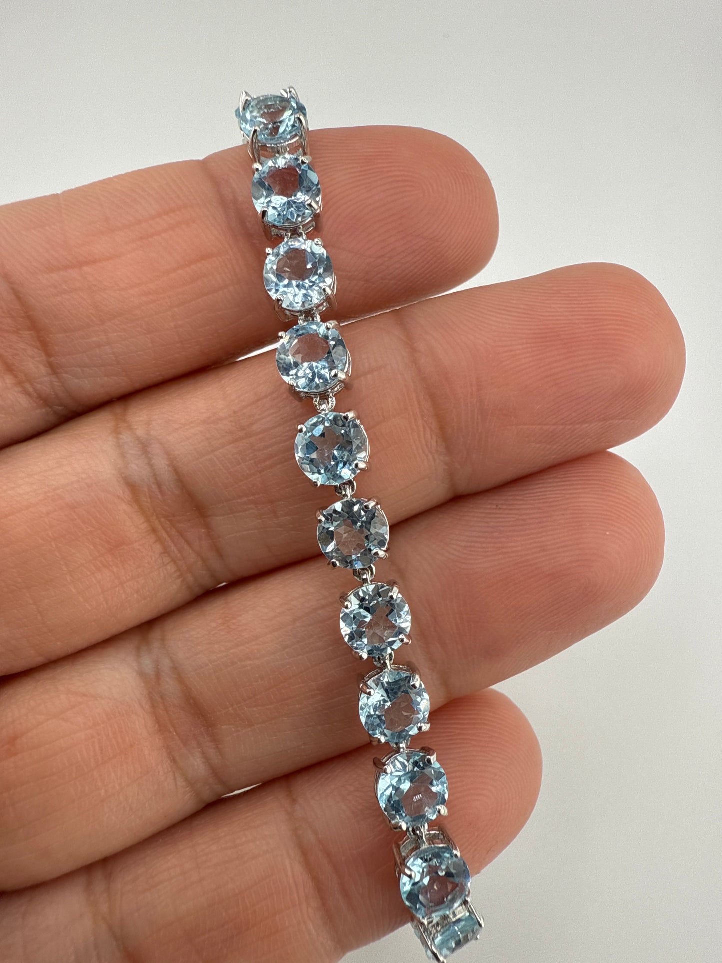 Sterling Silver, Four-Prong Blue Topaz Bracelet