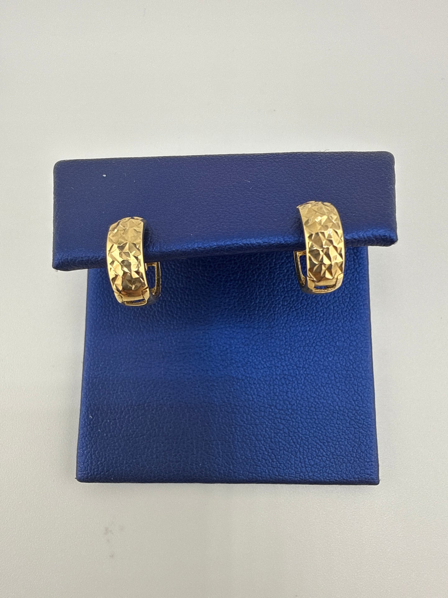 14k gold huggie earrings | hammered design | open backing