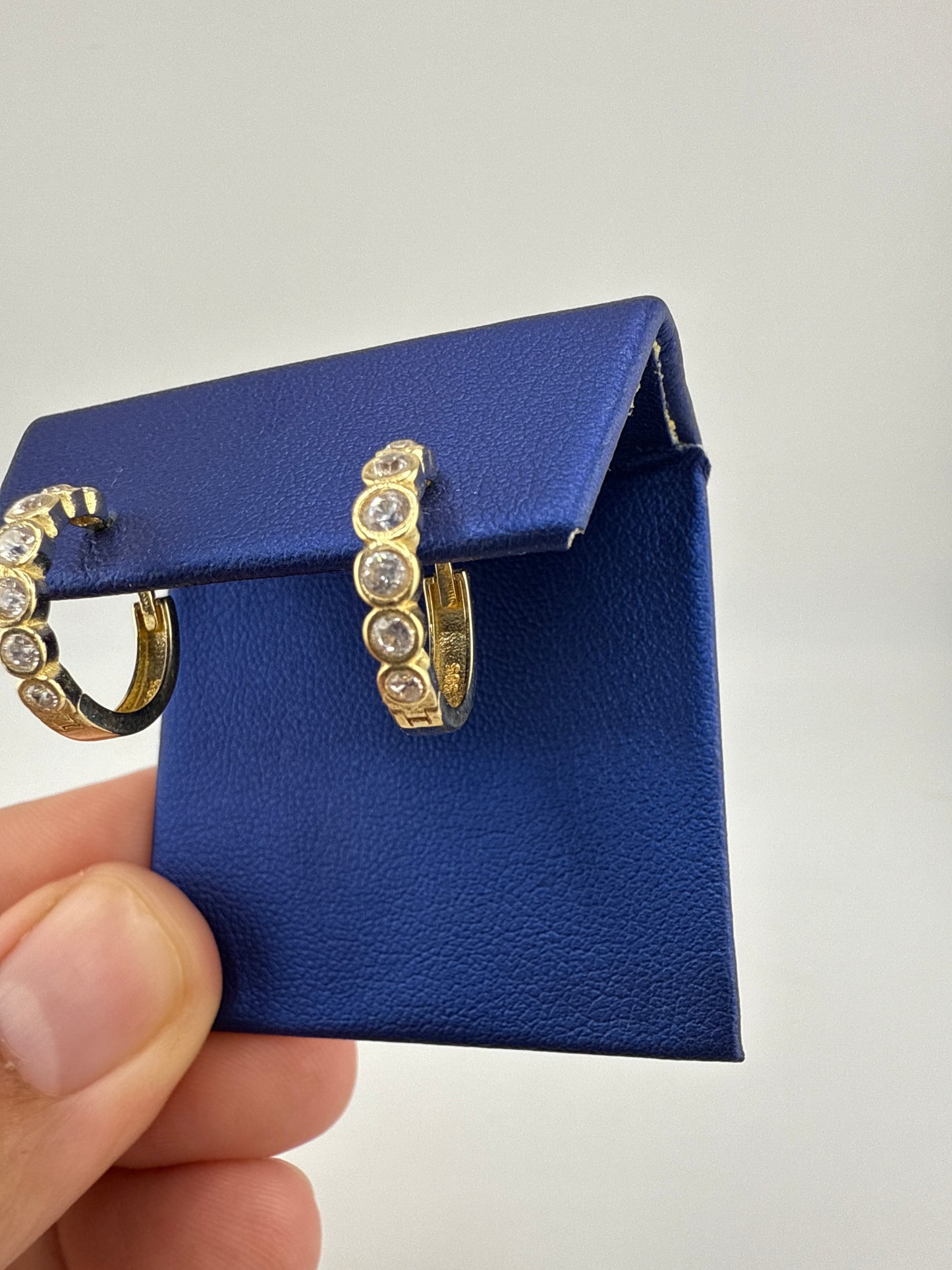 14k gold and zirconia huggie earring