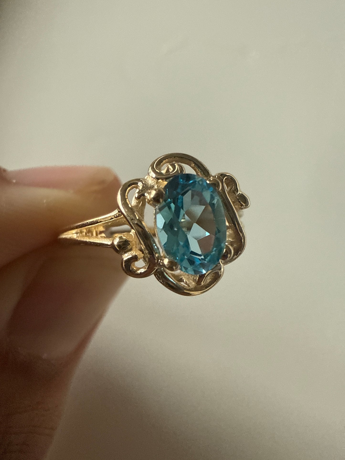 14k Gold 7x5mm Oval Blue Topaz Ring