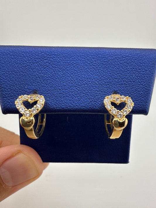 14k yellow and zirconia heart huggie earrings