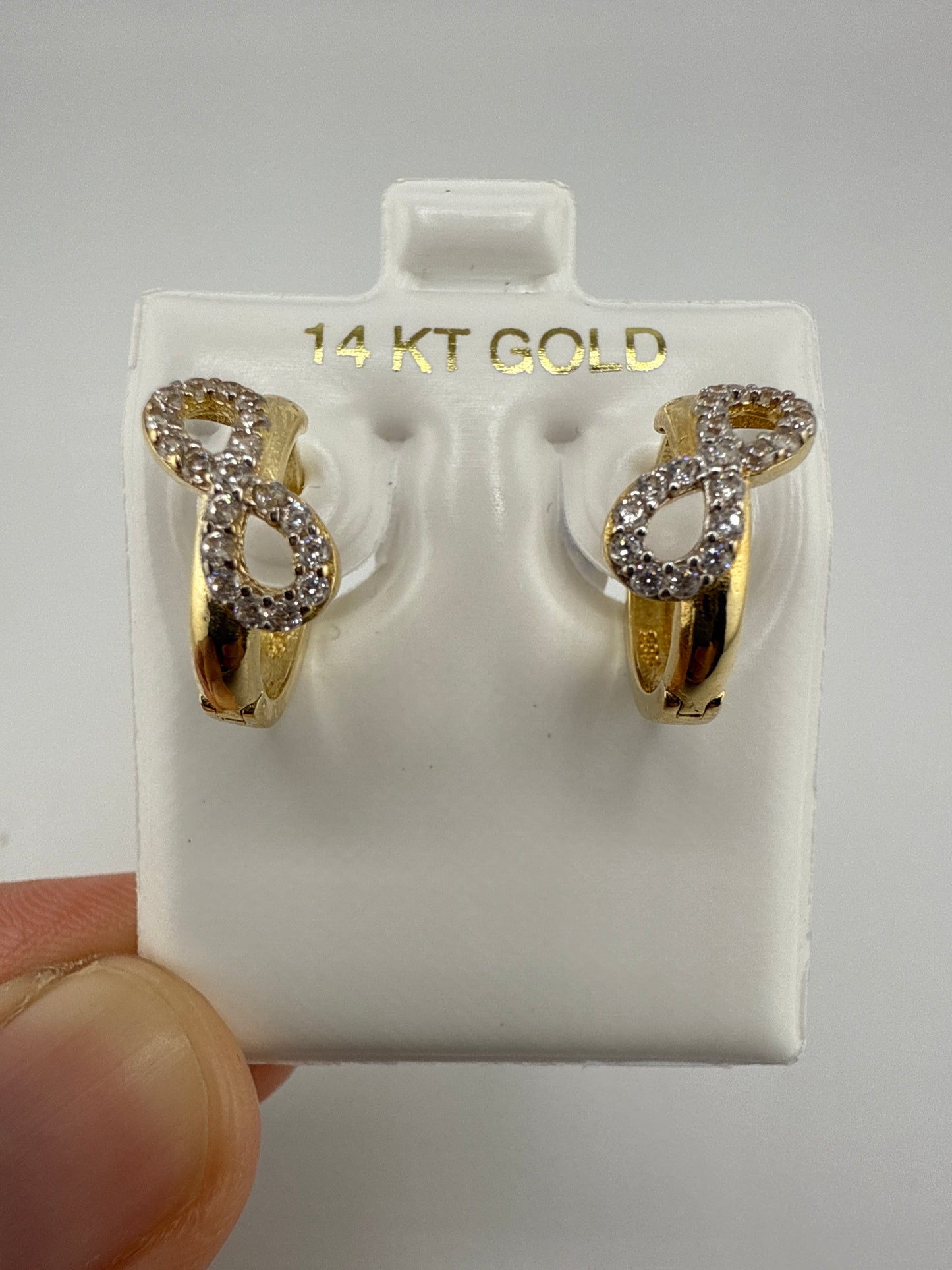 14k Yellow Gold and Zirconia Bow Huggie Earrings