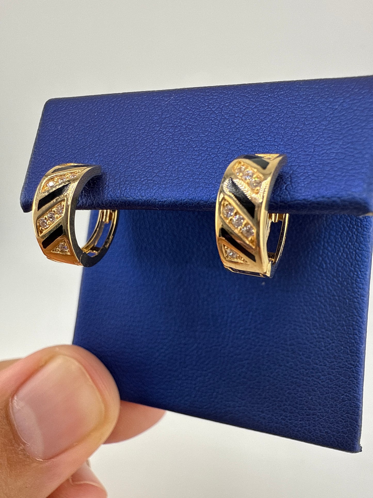 14k gold huggie earrings | two-toned striped design | open backing