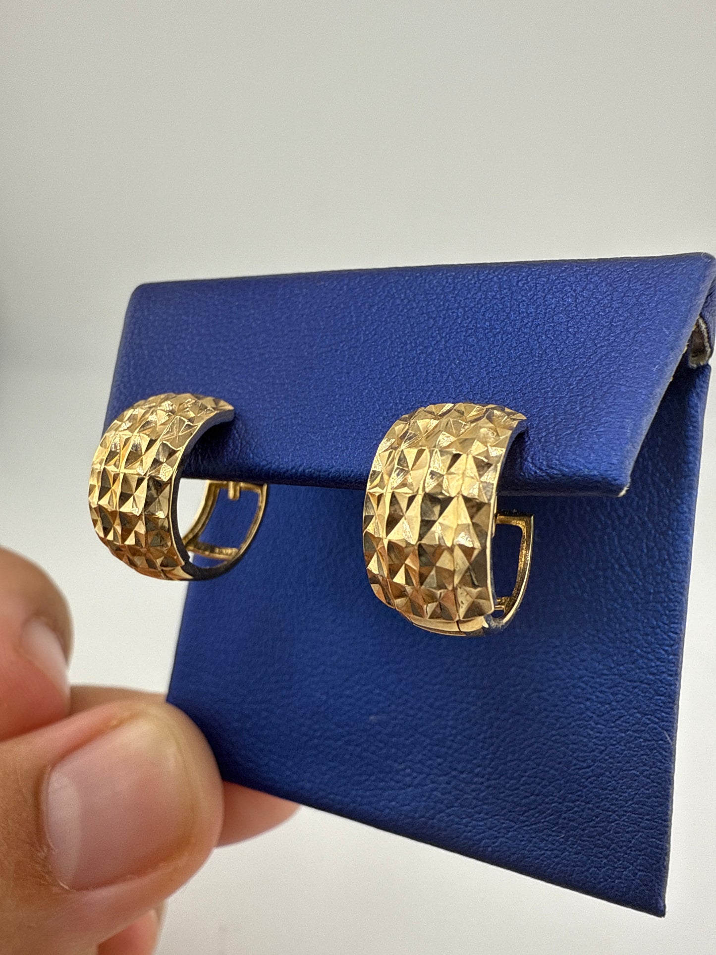14k yellow gold hammered huggie earring, thicker version