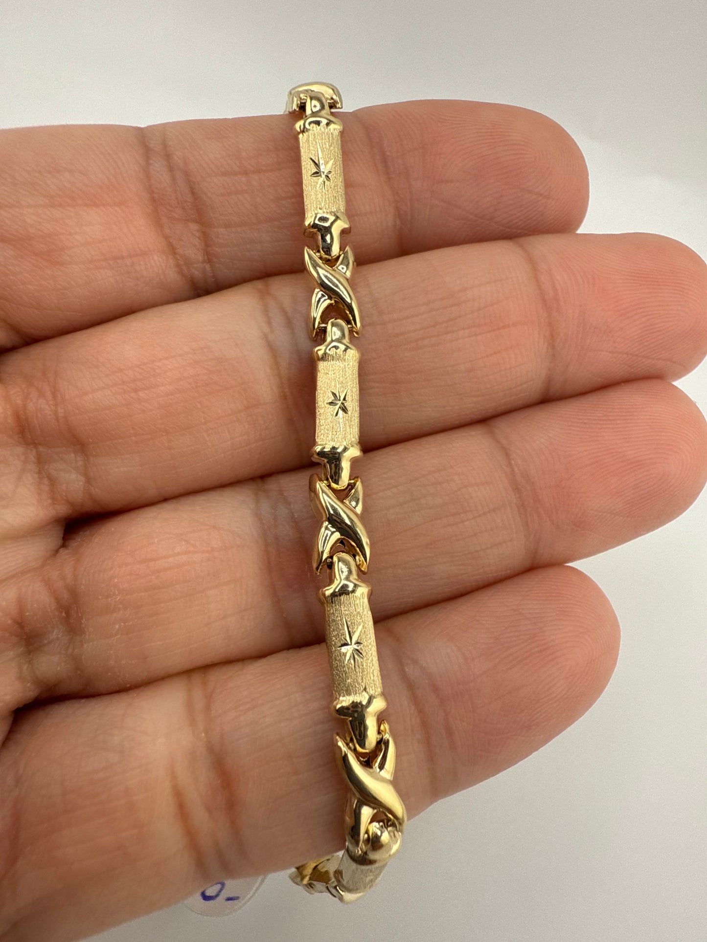 14k gold XO bracelet | star center design | 7.25 inches