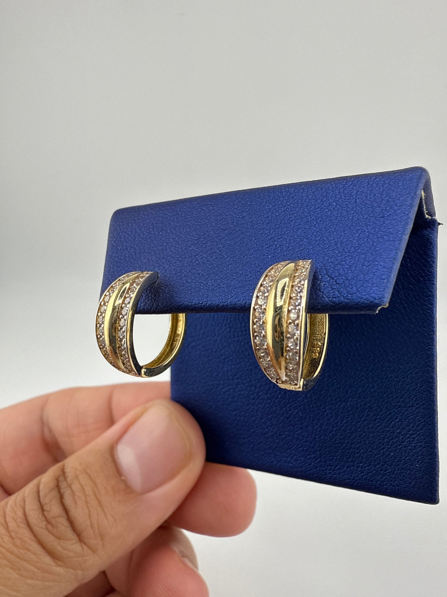 14k yellow gold and zirconia huggies, small and sophisticated
