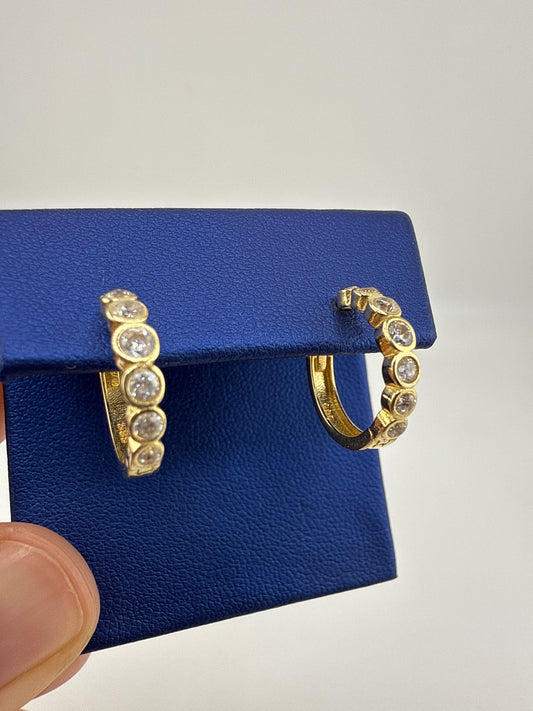 14k gold and zirconia huggie earring