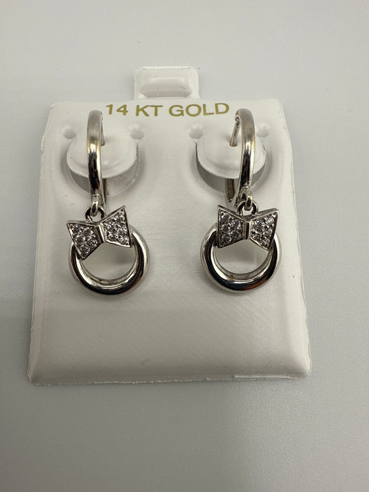 14k white and zirconia bow-tie huggie hoops