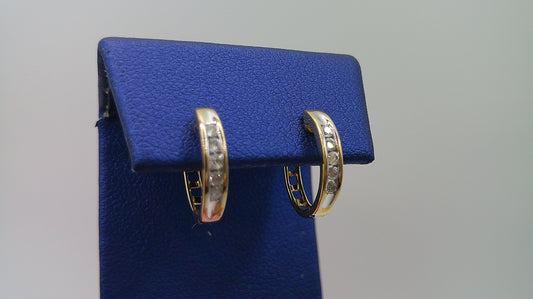 14k yellow gold diamond huggie earrings | .15 carat