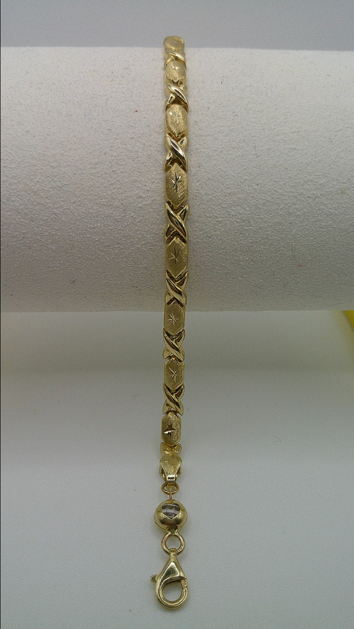14k yellow gold XO bracelet | star center | 7.25 inches