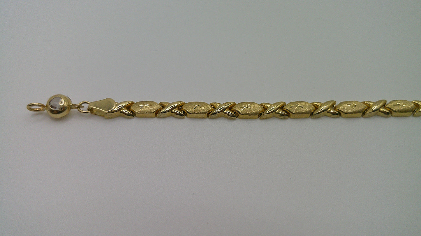 14k yellow gold XO bracelet | star center | 7.25 inches