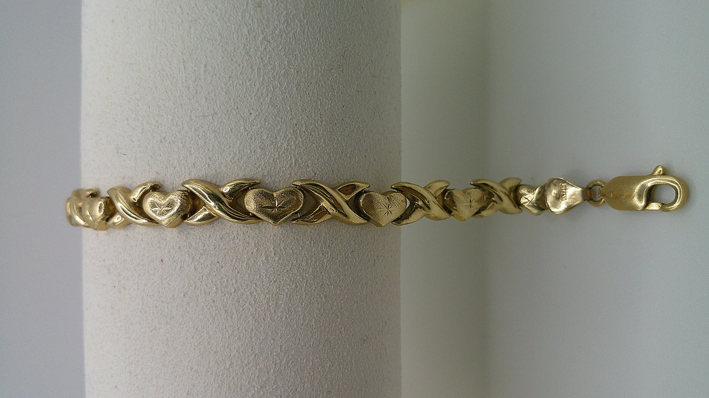 14k yellow gold XO bracelet | star center design | 7.5 inches
