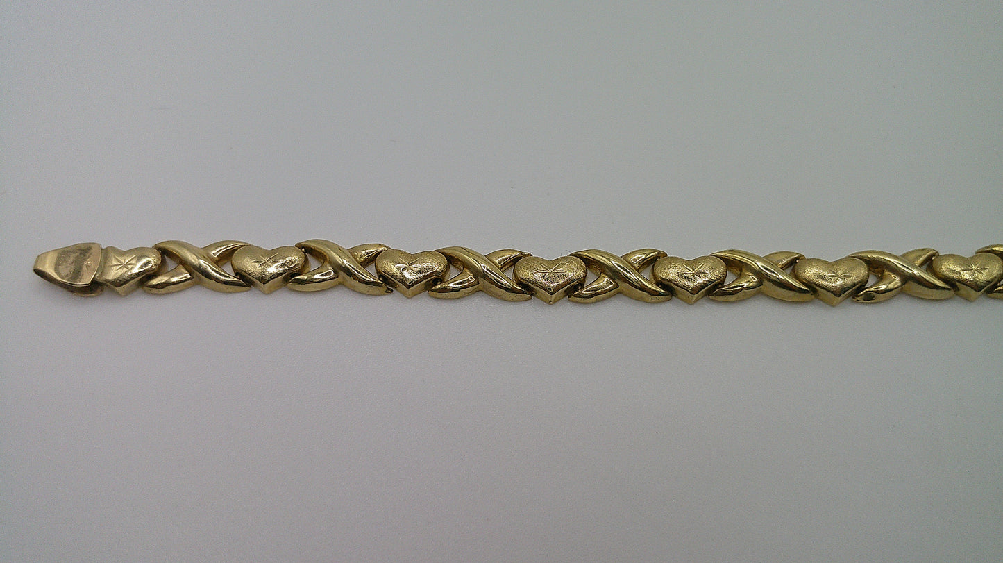 14k yellow gold XO bracelet | star center design | 7.5 inches
