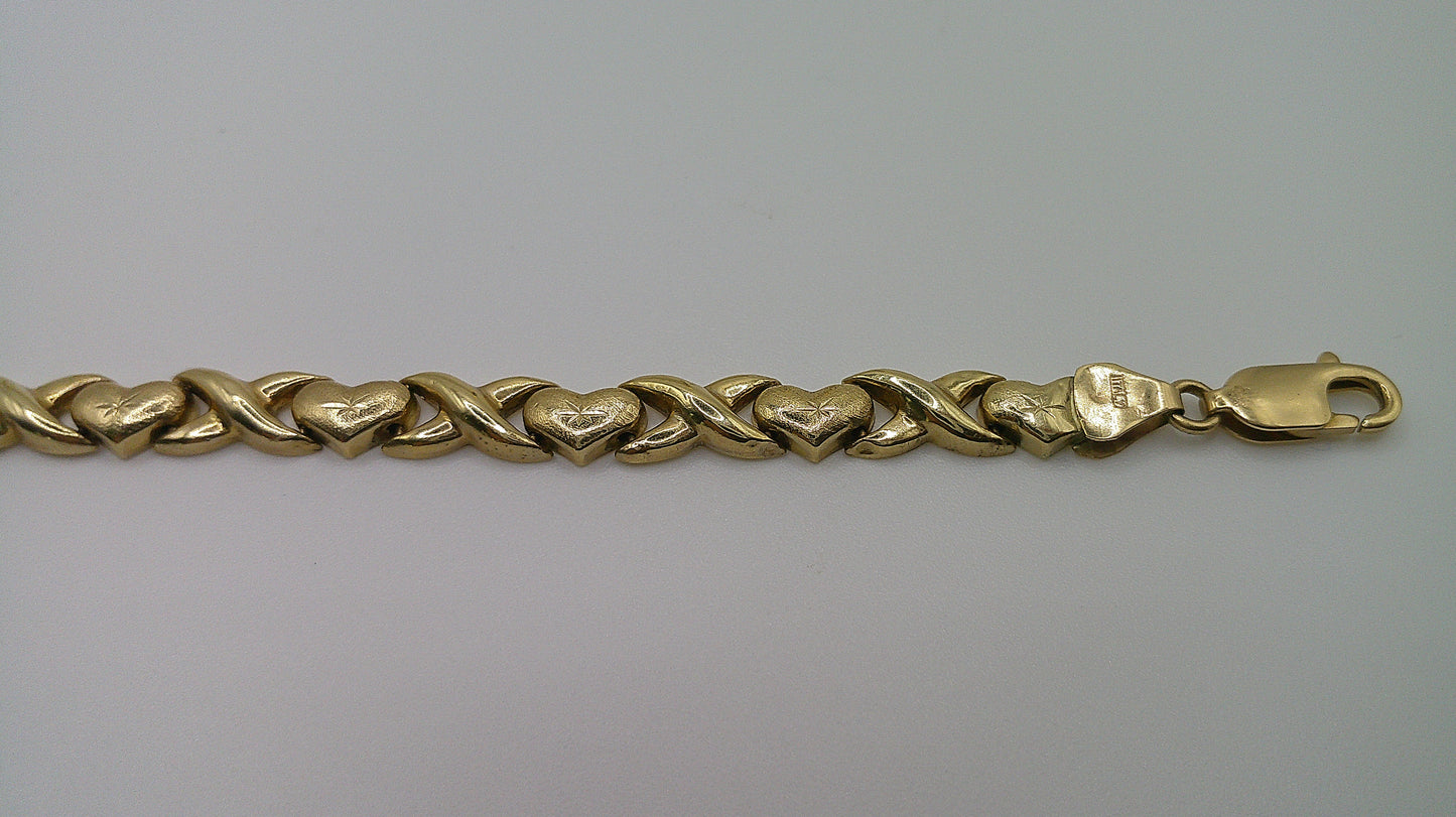 14k yellow gold XO bracelet | star center design | 7.5 inches