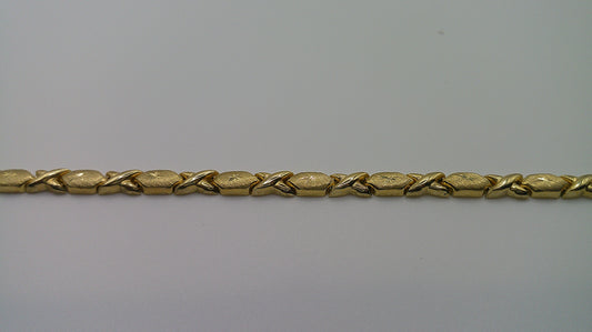 14k gold XO bracelet | 7.25 inches