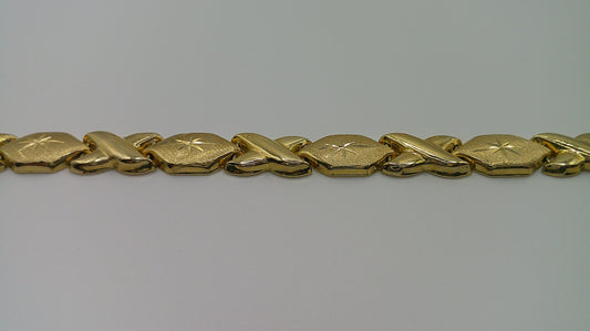 14k gold XO bracelet | star center detail | 7 inches