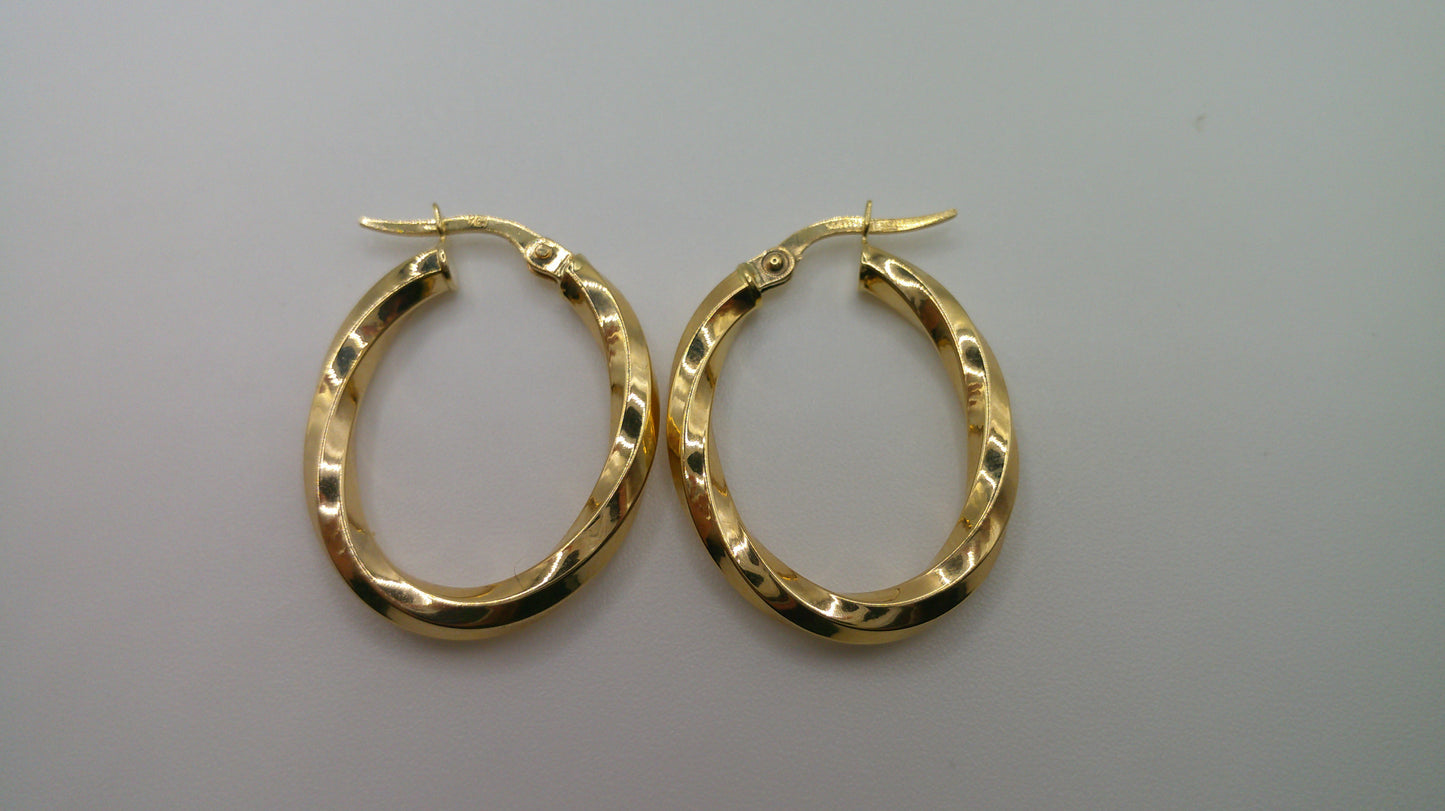 14k yellow gold | oval shiny twist hoop