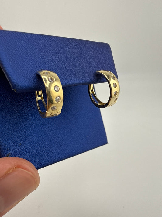 14k gold huggie earrings | zirconia | open backing