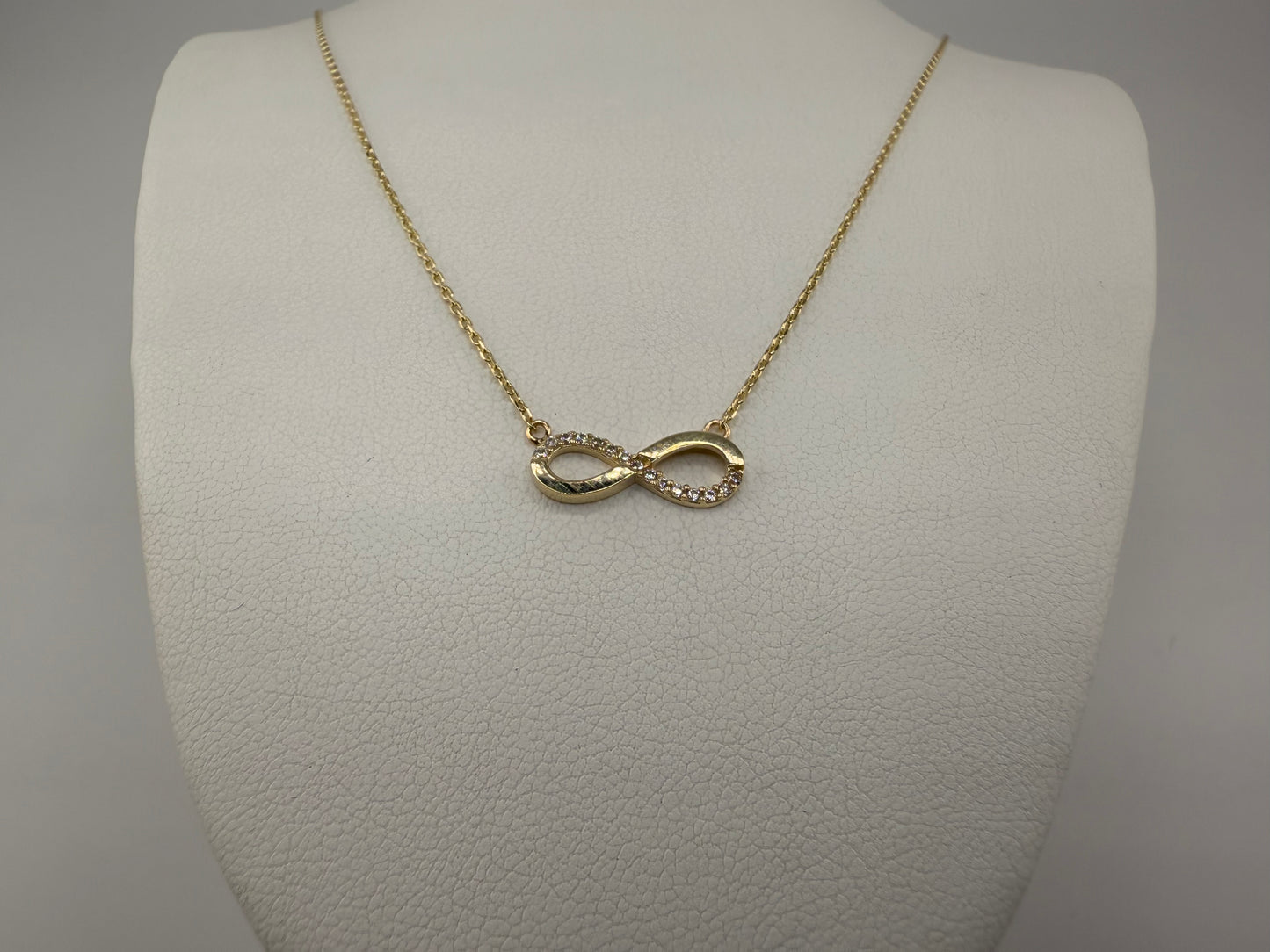 14k gold infinity pendant with zirconia and chain