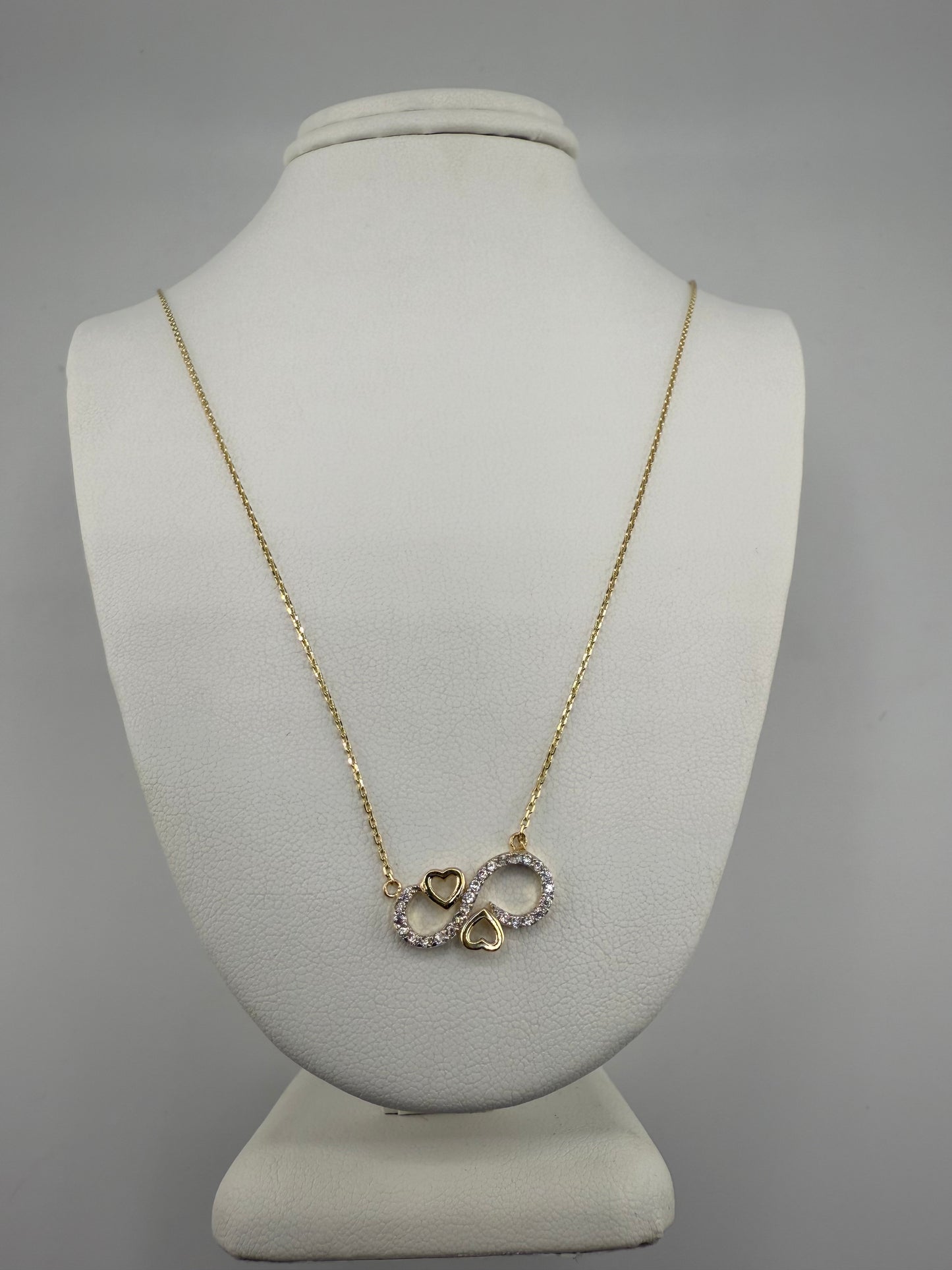 14k gold infinity and heart pendant with zirconia