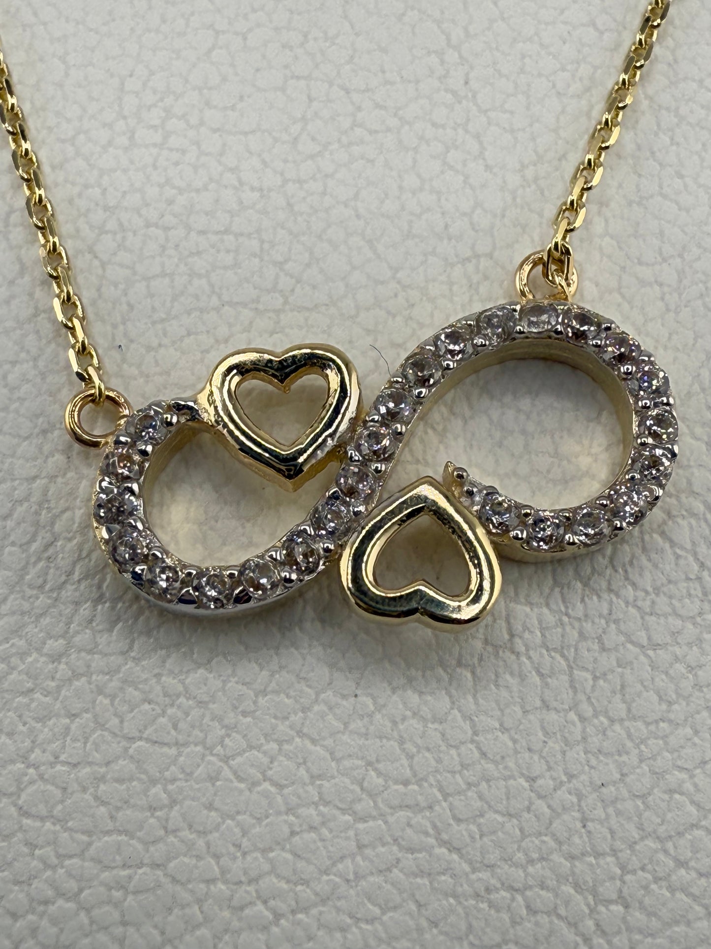 14k gold infinity and heart pendant with zirconia