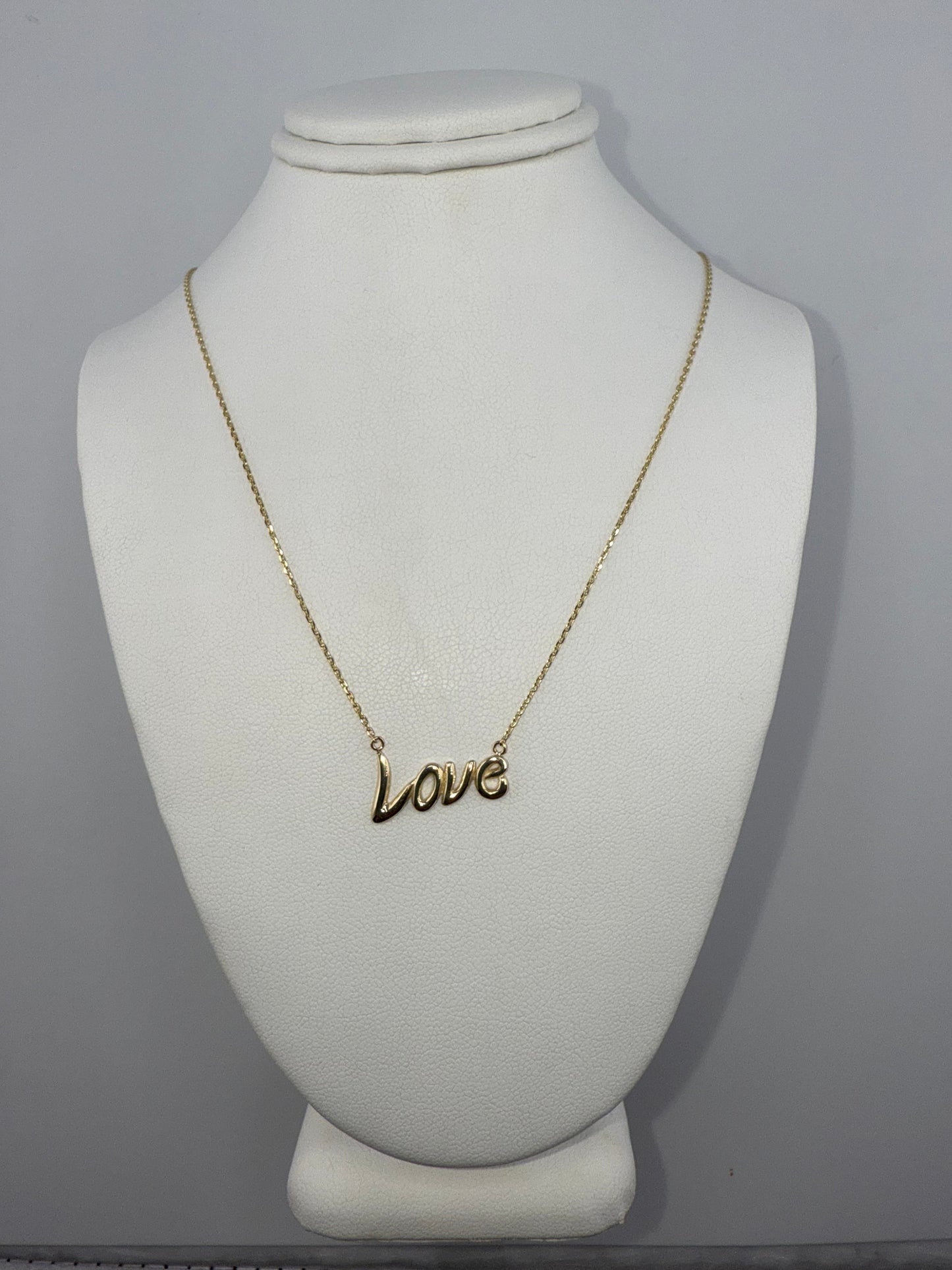 14k gold “Love” pendant and chain