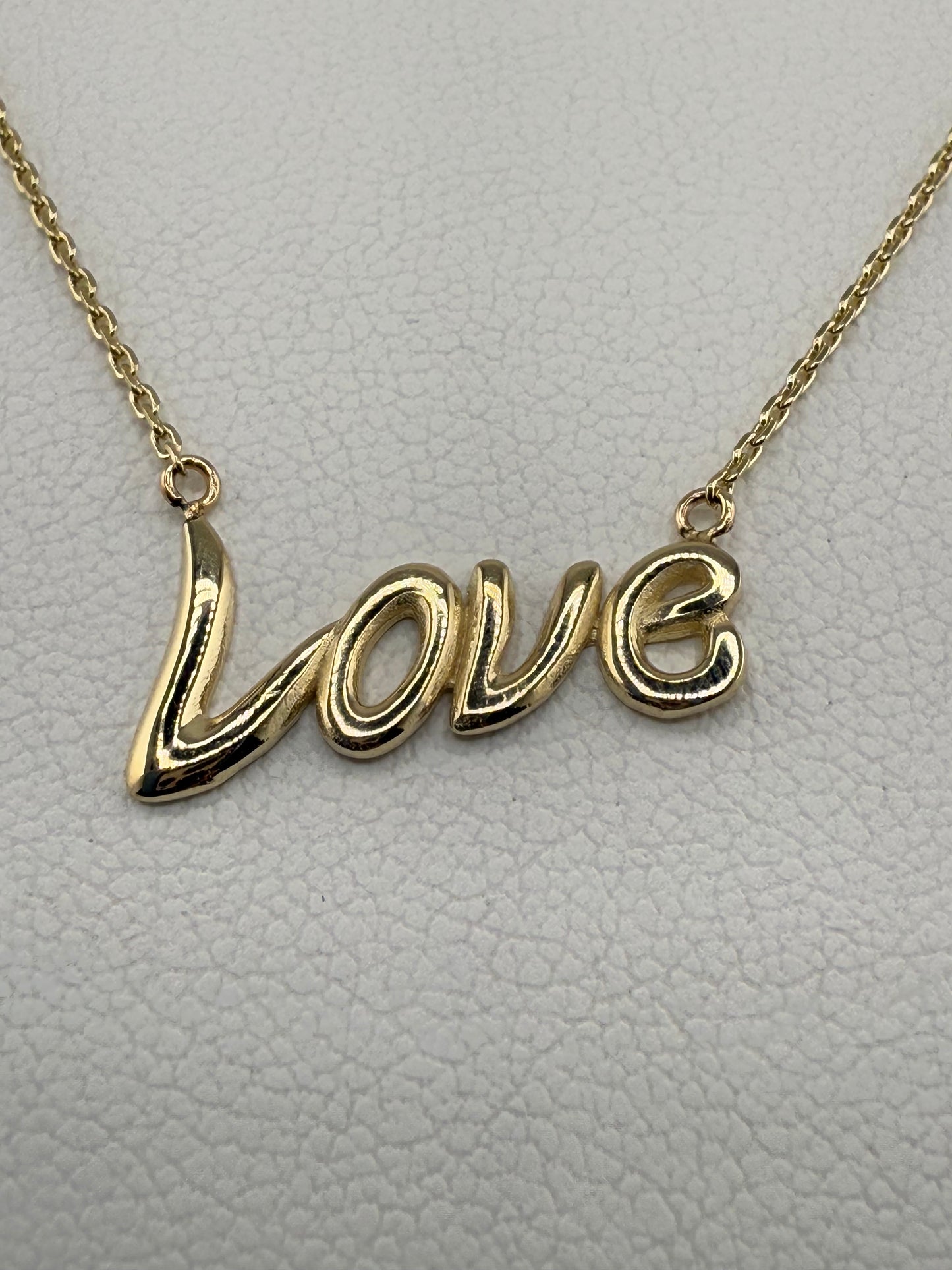 14k gold “Love” pendant and chain