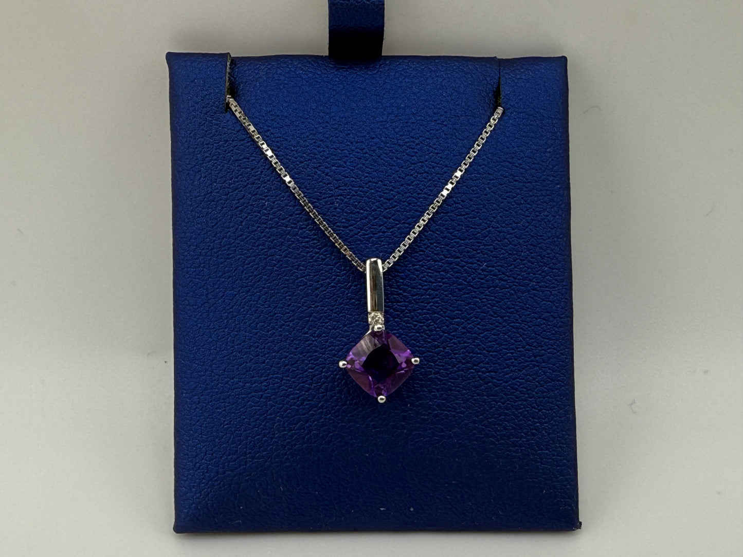 14k white gold box chain with purple gemstone pendant