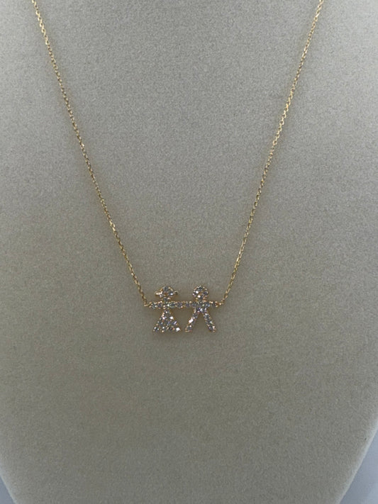 14k yellow gold with zirconia pendant with boy and girl symbol