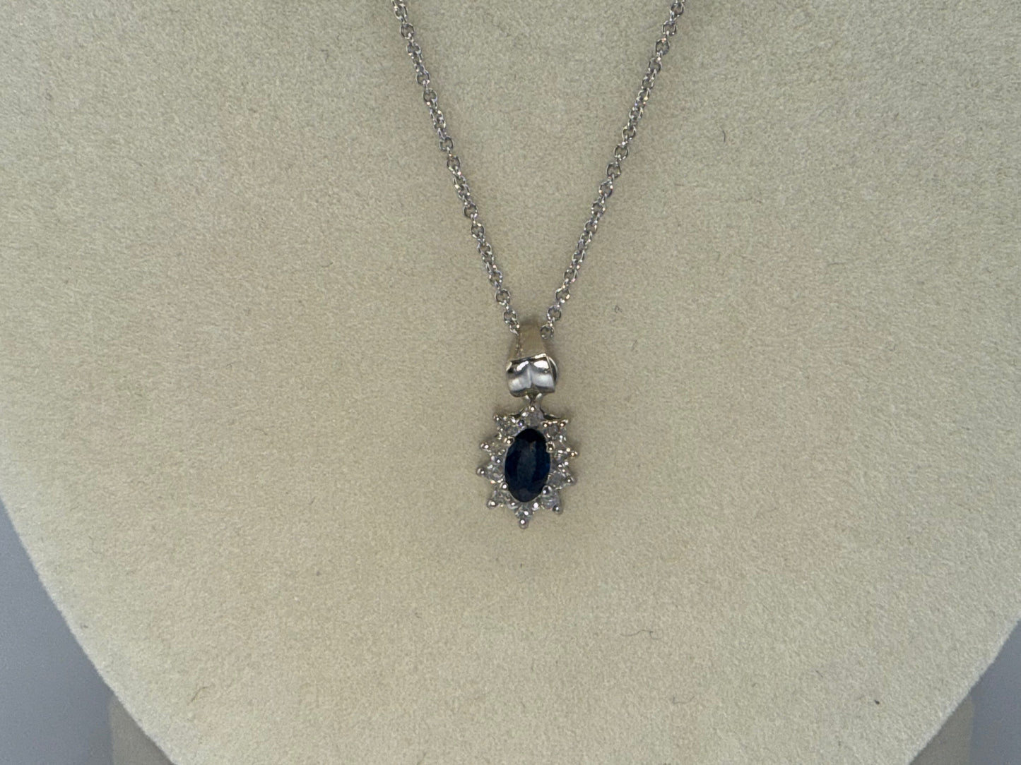 14k white gold with blue sapphire and zirconia pendant