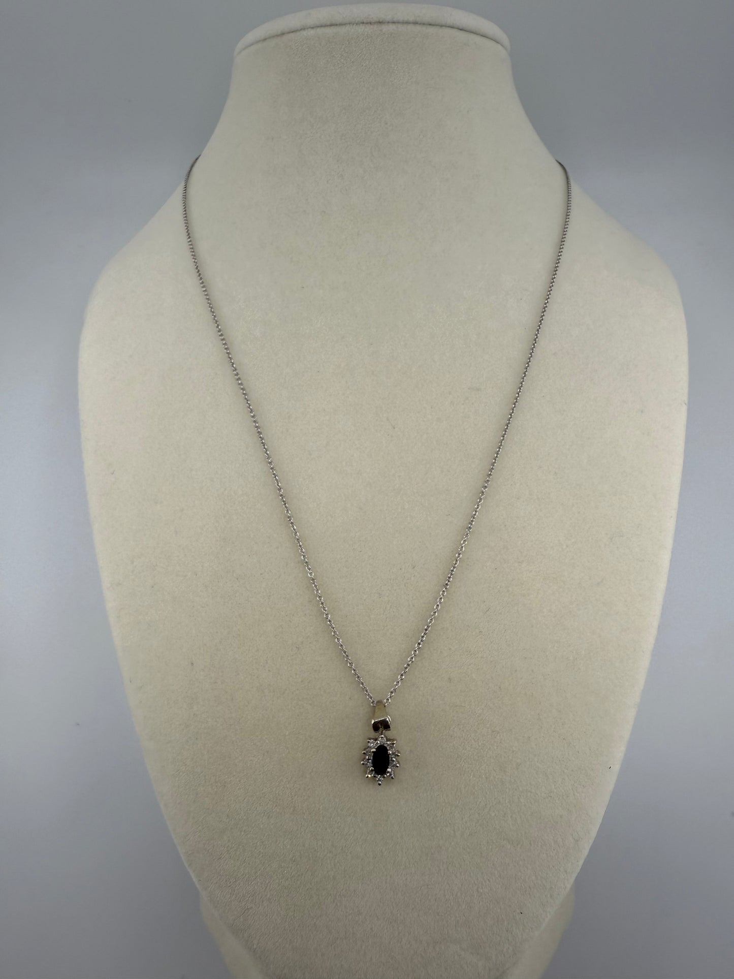 14k white gold with blue sapphire and zirconia pendant