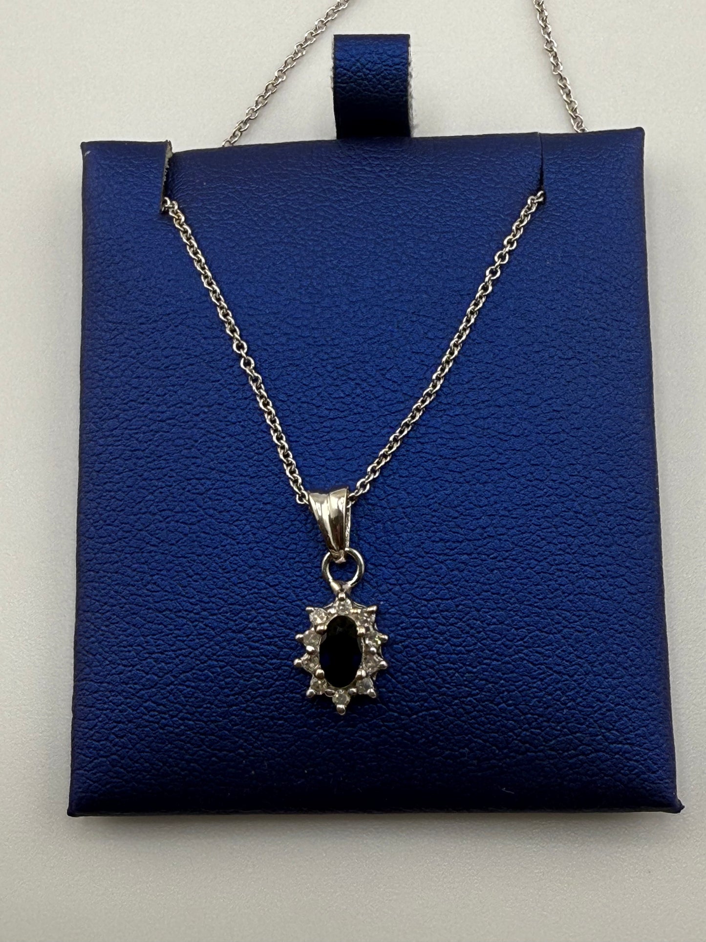 14k white gold with blue sapphire and zirconia pendant
