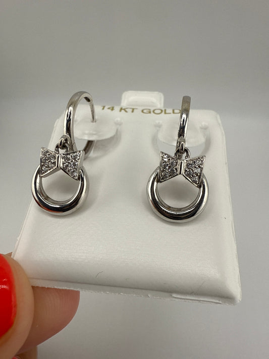 14k white and zirconia bow-tie huggie hoops