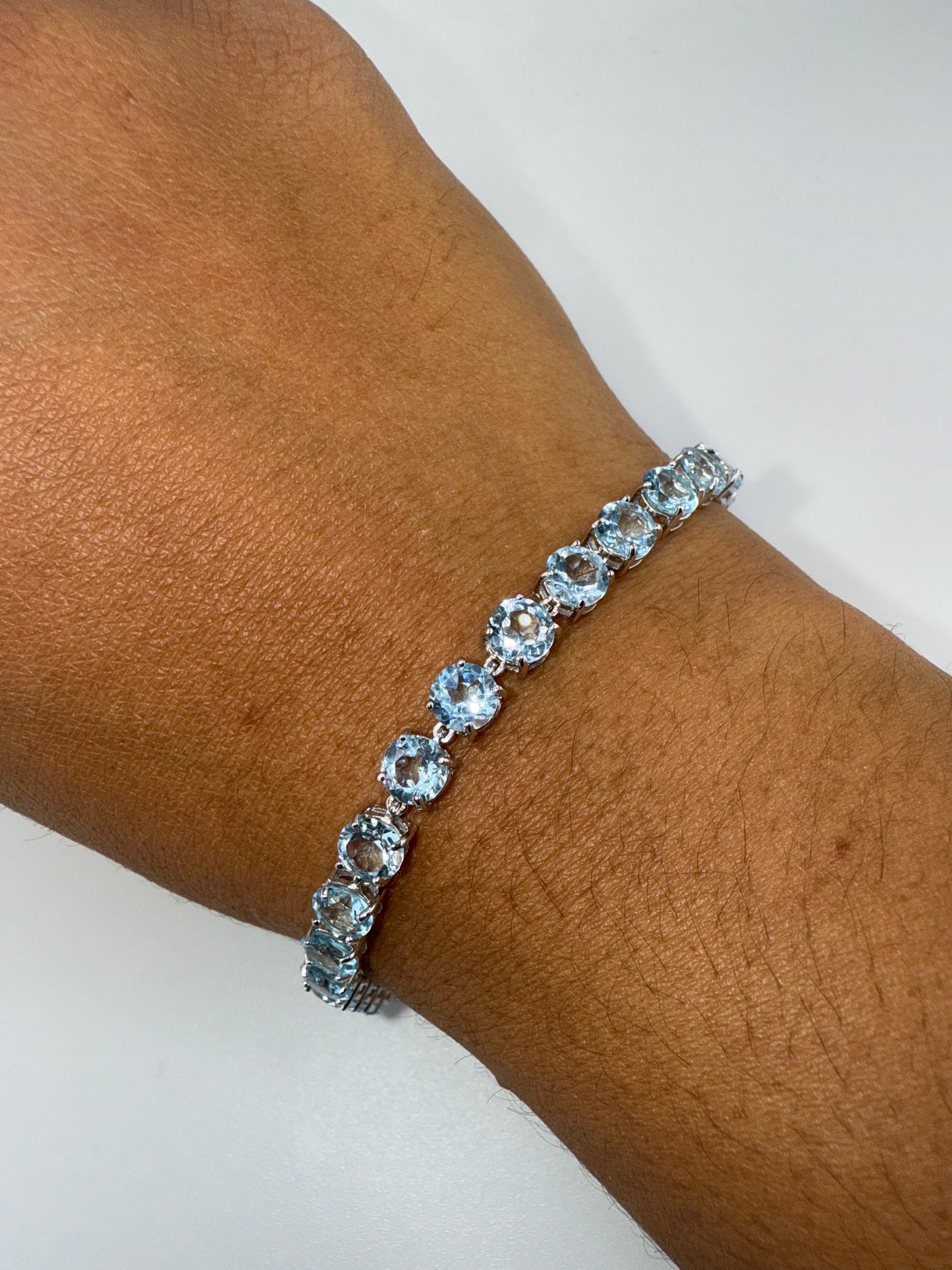 Sterling Silver, Four-Prong Blue Topaz Bracelet