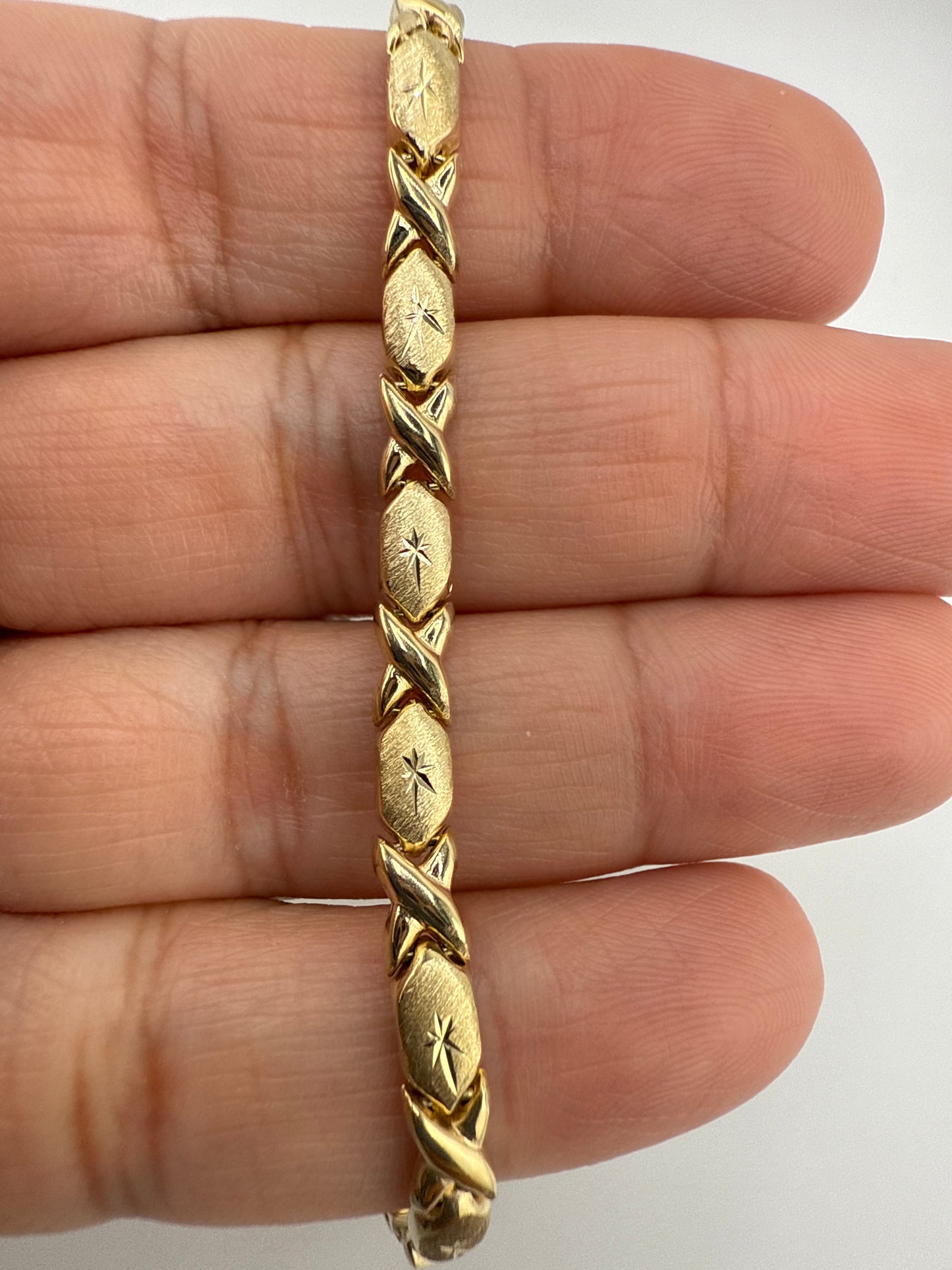 14k yellow gold XO bracelet | star center | 7.25 inches