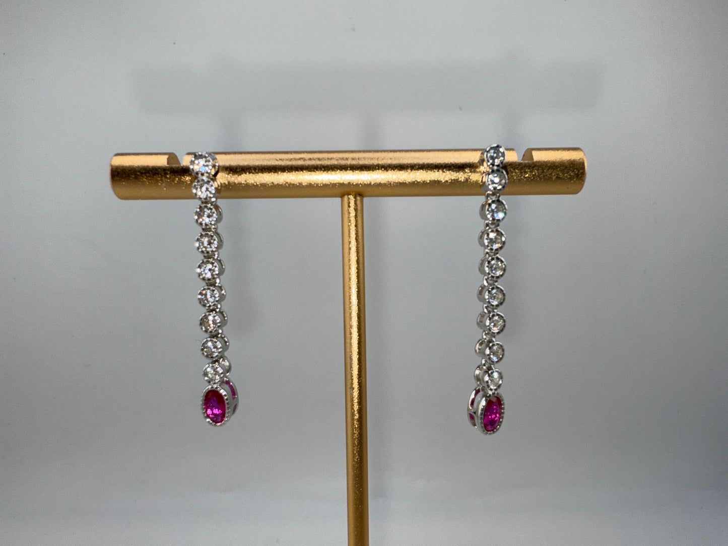 Sterling Silver Beaded Outline Oval and Round Zirconia Earrings - Ruby