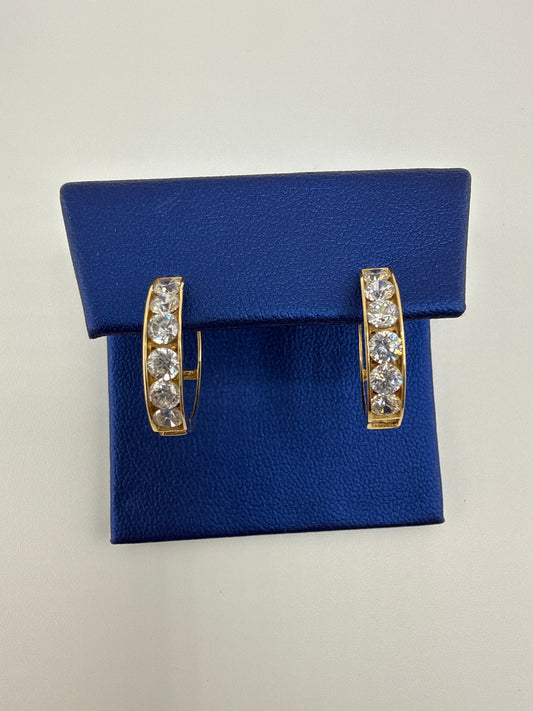 14k yellow gold and zirconia huggie earrings