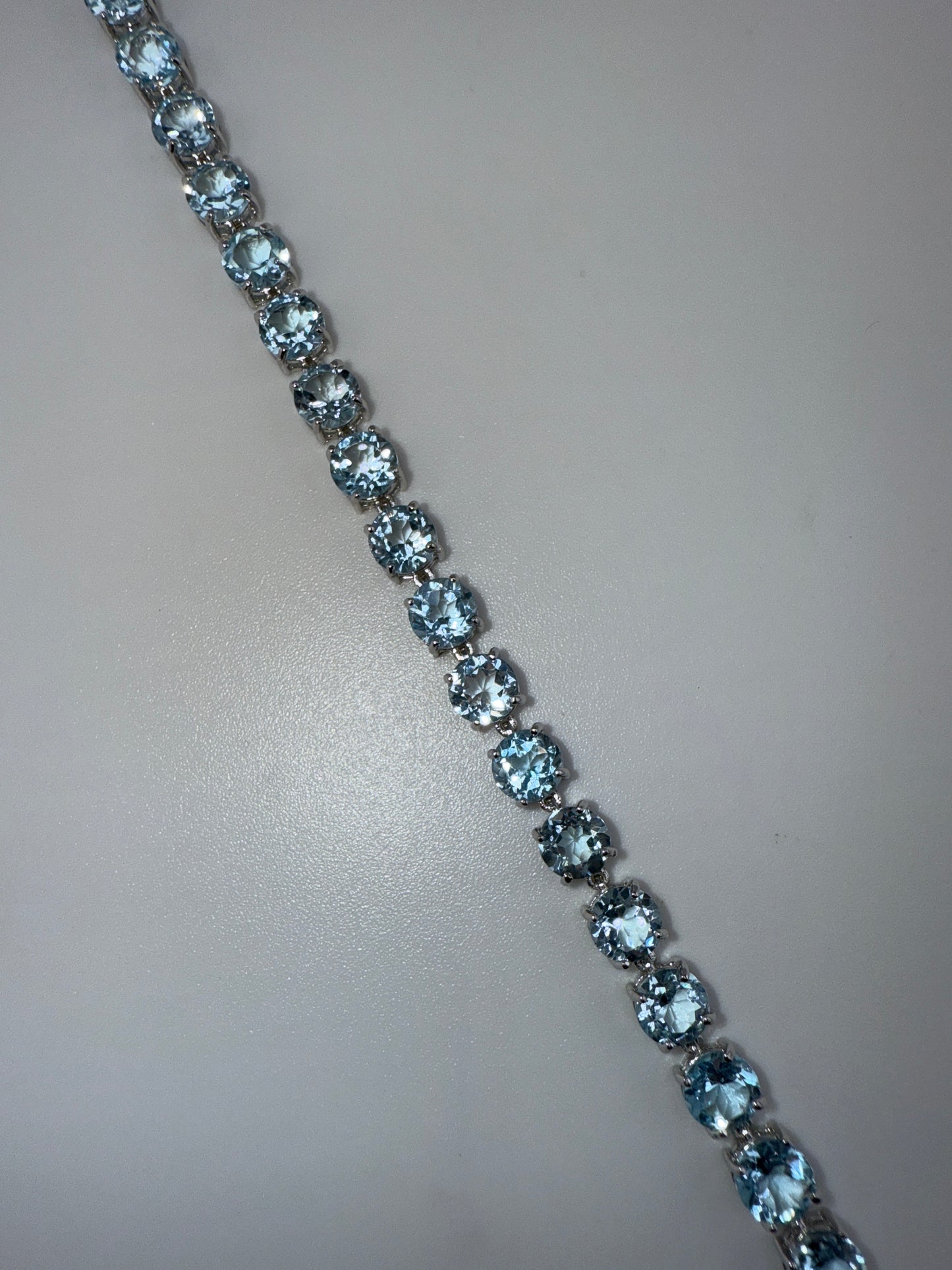 Sterling Silver, Four-Prong Blue Topaz Bracelet