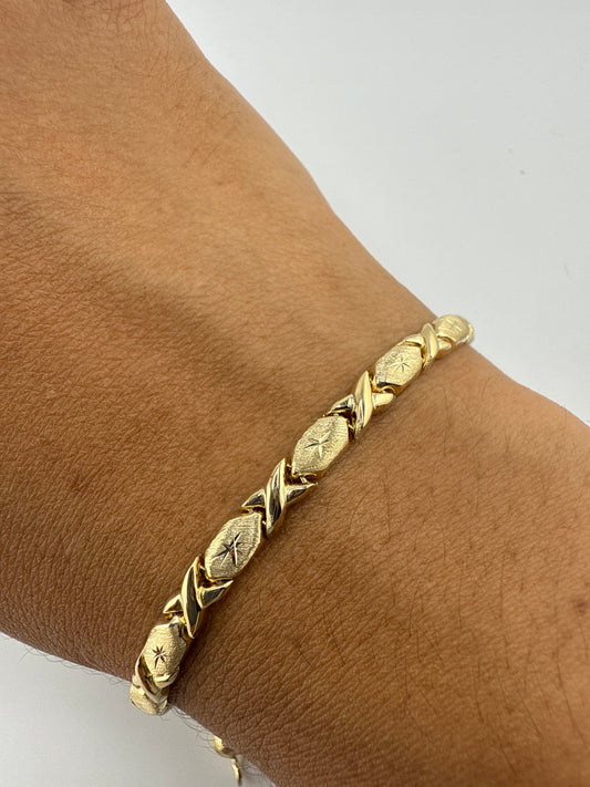 14k yellow gold XO bracelet | star center | 7.25 inches