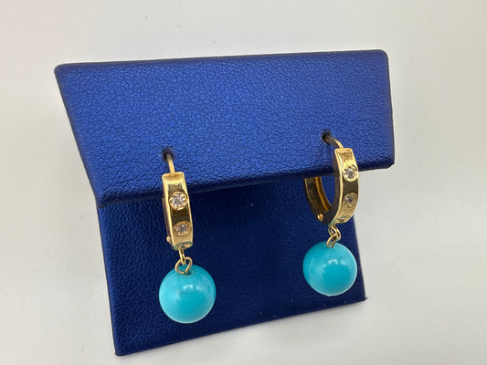 14k Gold and Zirconia Huggies with baby blue details